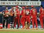 Players shake hands after SRH beats PBKS by 9 wickets.