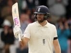 Cricket - Third Test - England v India - Headingley, Leeds, Britain - August 26, 2021 England's Dawid Malan celebrates reaching his half century Action Images via Reuters/Lee Smith