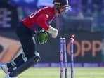 England's Jos Buttler runs out Bangladesh's Afif Hossain during the Cricket Twenty20 World Cup match between England and Bangladesh in Abu Dhabi, UAE, Wednesday, Oct. 27, 2021.