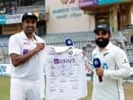 R Ashwin hands Ajaz Patel with a signed jersey after the second Test between India and New Zealand&nbsp;