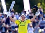 Australia's Alyssa Healy celebrates century against England during the final of the ICC Women's Cricket World Cup in Christchurch, New Zealand.