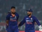 India's captain Rishabh Pant, right gestures to India's Avesh Khan, during the third Twenty20 cricket match between India and South Africa