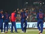India's Harshal Patel, center celebrates the dismissal of South Africa's David Miller, unseen during the third Twenty20 cricket match
