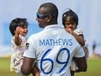 Angelo Mathews holds his daughters&nbsp;