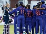 India players celebrate after winning the match as England's Charlie Dean looks dejected&nbsp;