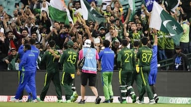 Pakistan players wave to their supporters following the T20 World Cup cricket semifinal between New Zealand and Pakistan in Sydney, Australia, Wednesday, Nov. 9, 2022. Pakistan defeated New Zealand by seven wickets. (AP Photo/Rick Rycroft)