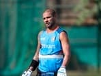 Shikhar Dhawan attends a training session