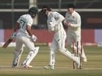 New Zealand's Tom Blundell (R) stumps out Pakistan's Abdullah Shafique (L)