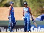 India Women's captain Harmanpreet Kaur and teammate Richa Ghosh celebrate their partnership during the Group A match against United Arab Emirates Women