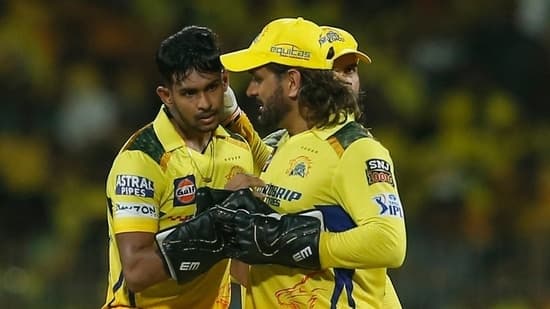 Chennai Super Kings' Matheesha Pathirana celebrating a wicket with MS Dhoni.