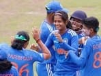 Shreyanka Patil celebrating with her teammates