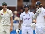 Stuart Broad and Pat Cummins had a brief exchange after Jonny Bairstow's dismissal.