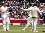 Travis Head points as he talks with Jonny Bairstow during the second Ashes Test