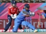 India's Shikha Pandey hits a reverse sweep