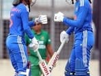 India's Smriti Mandhana and Jemimah Rodrigues fist bump each other during the match