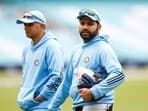  India's Rohit Sharma with head coach Rahul Dravid during practice 