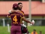 Brandon King and Shai Hope embrace after beating India by 8 wickets in the fifth T20I