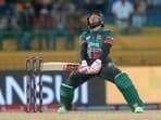Mushfiqur Rahim reacts after missing a shot during the Asia Cup