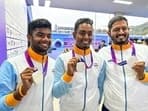 Indian men’s recurve team comprising of Atanu Das, Dhiraj Bommadevara and Tushar Shelke with silver medal in the team event
