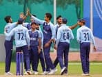India's R Sai Kishore celebrates the dismissal of a Bangladeshi batter during men's cricket semifinal match between India and Bangladesh at the 19th Asian Games, in Hangzhou