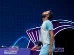 India's HS Prannoy reacts after losing a point against China's Li Shifeng in the Men's Singles semifinal badminton match at the 19th Asian Games