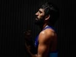 Bajrang Punia reacts after losing to Japan's Kaiki Yamaguchi in the men's freestyle 65kg category wrestling match for the bronze medal at the 19th Asian Games