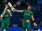 Aiden Markram celebrates his century during the ICC Men's Cricket World Cup match between Sri Lanka and South Africa