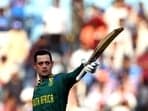 South Africa's Quinton de Kock celebrates after scoring a century (100 runs) during the 2023 ICC Men's Cricket World Cup one-day international (ODI) match between Australia and South Africa