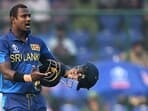 Sri Lanka's Angelo Mathews reacts after he was timed out during the 2023 ICC Men's Cricket World Cup one-day international (ODI) match between Bangladesh and Sri Lanka
