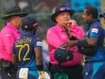 Charith Asalanka and Angelo Mathews talk to umpires after the latter is given 'timed out' during the ICC Cricket World Cup 2023 match between Sri Lanka and Bangladesh