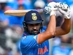 India's captain Rohit Sharma watches the ball after playing a shot 