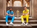India Captain Rohit Sharma and Australia Captain Pat Cummins pose for a picture with the trophy ahead of their ICC Men's Cricket World Cup 2023 final match, at Adalaj Stepwell in Adalaj on Saturday.