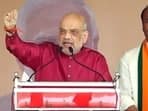 Union home minister Amit Shah addresses a public meeting for the Telangana Assembly elections. 