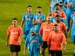 India's head coach Rahul Dravid, skipper Rohit Sharma and other players after the ICC Men's Cricket World Cup 2023 final at the Narendra Modi Stadium in Ahmedabad
