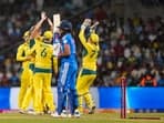Australia's Annabel Sutherland with teammates, celebrates the wicket of India's Harmanpreet Kaur 