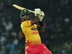 Zimbabwe's Luke Jongwe plays a shot during the second Twenty20 international vs Sri Lanka