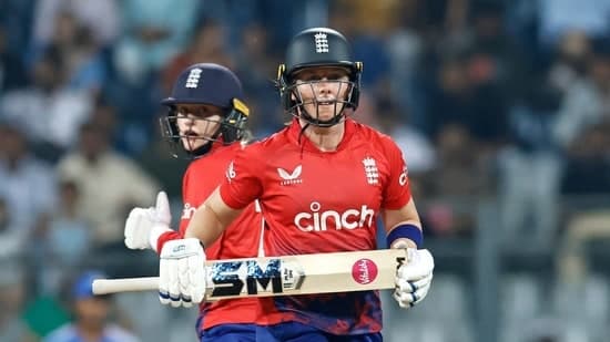 England's skipper Heather Knight and Charlie Dean run between the wickets