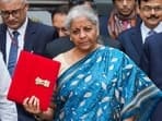 :Union finance minister Nirmala Sitharaman carrying a folder-case containing the Interim Budget 2024 leaves from the finance ministry ahead of the presentation of the budget in New Delhi on Thursday, 