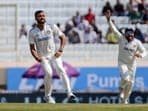 India's Akash Deep and skipper Rohit Sharma celebrate the wicket of England's Ben Duckett on Day 1 of the 4th Test 