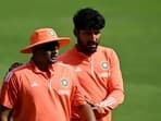 India's Sarfaraz Khan and Dhruv Jurel (R) attend a practice session