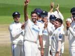 India's R Ashwin shows the ball as he takes a five-wicket haul during the 3rd day of the fifth Test cricket match between India and England, in Dharamsala, Satutday, March 9