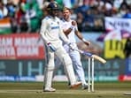 England's James Anderson celebrates after taking the wicket of India batter Shubman Gill. 