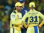 Chennai Super Kings' captain Ruturaj Singh with teammate MS Dhoni and the umpires in a conversation 