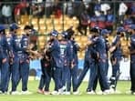 Lucknow Super Giants' players exchange handshakes after winning the match against Royal Challengers Bengaluru by 28 runs in the Indian Premier League (IPL) 2024