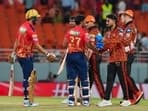 Ashutosh Sharma and Shashank Singh shake hands with SRH players after the match.