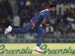 Lucknow Super Giants Mayank Yadav bowls a delivery during the Indian Premier League cricket match between Gujarat Titans and Lucknow Super Giants.