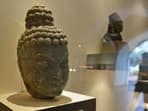 A sculpture of the head of Gautam Buddha, the founder of Buddhism, on display at the gallery. The gallery is curated by the Archaeological Survey of India (ASI). Most of the objects retrieved are through the ministry of external affairs and other law enforcement agencies and are stored at the ASI’s central antiquity collection (CAC) or other authorities. (Biplov Bhuyan / HT Photo)