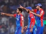 Delhi Capitals' bowlers Ishant Sharma, Axar Patel and Rasikh Salam appeal for a dismissal