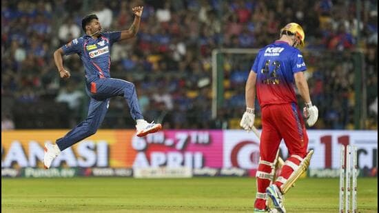 Lucknow Super Giants pacer Mayank Yadav celebrates after taking a wicket against the Royal Challengers Bengaluru on April 2. (PTI Photo)