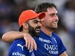 Royal Challengers Bengaluru's Virat Kohli and Will Jacks (R) celebrate their team's win in the Indian Premier League match against Gujarat Titans.